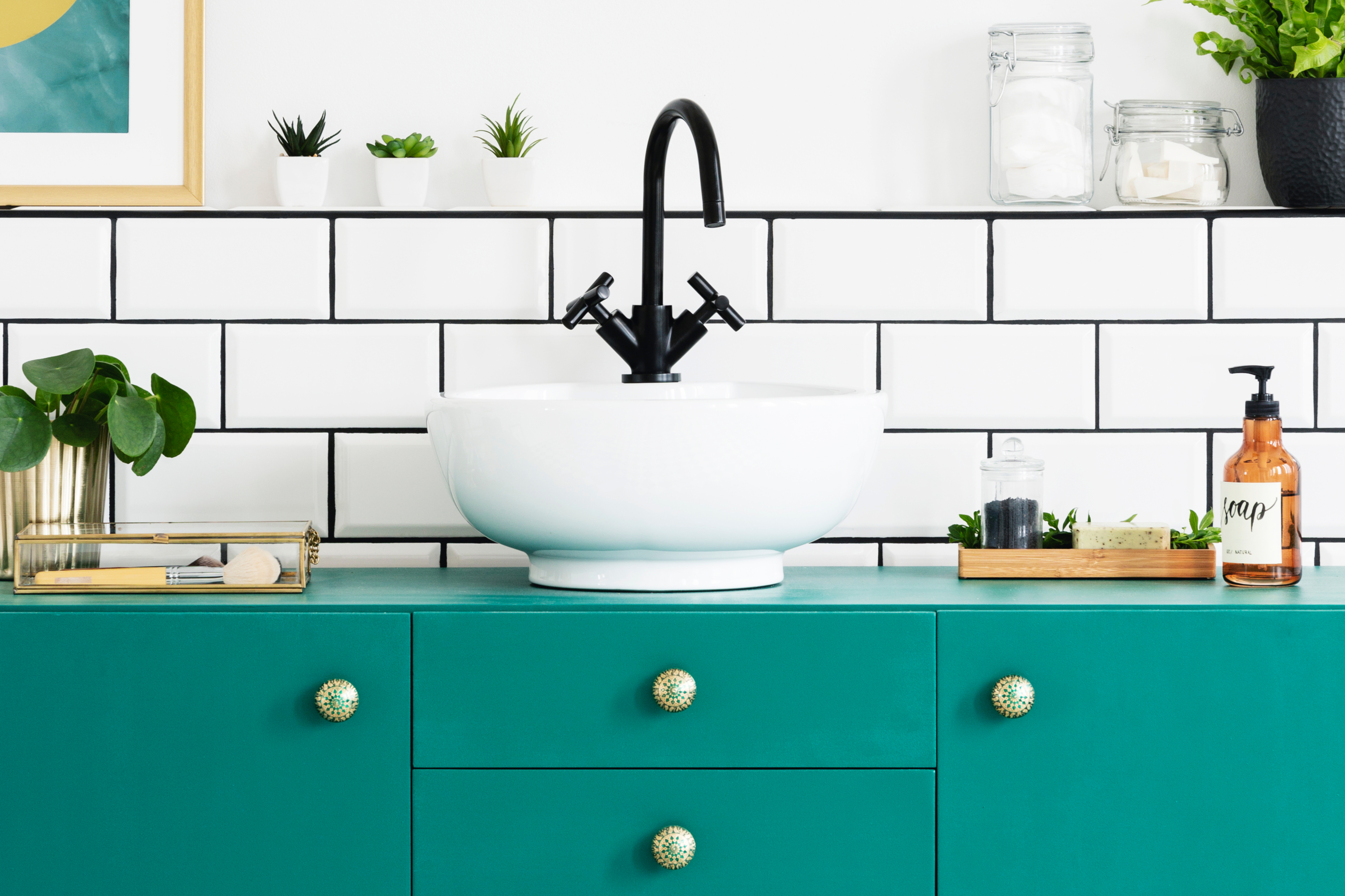 Bathroom with green vanity